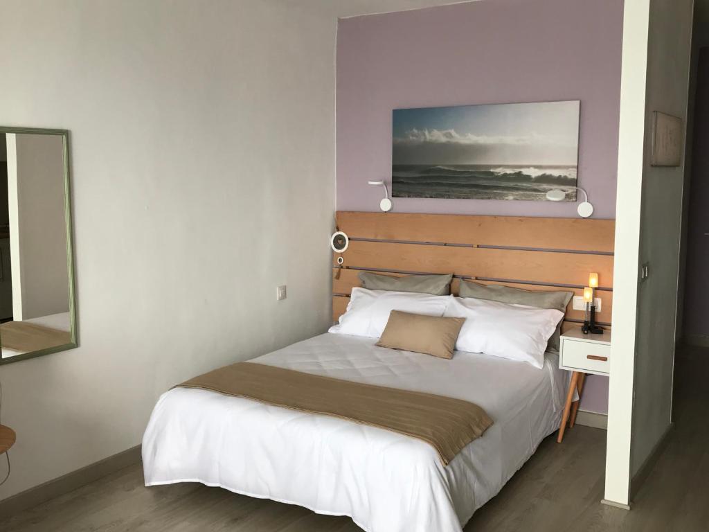Postel nebo postele na pokoji v ubytování Monisunset
