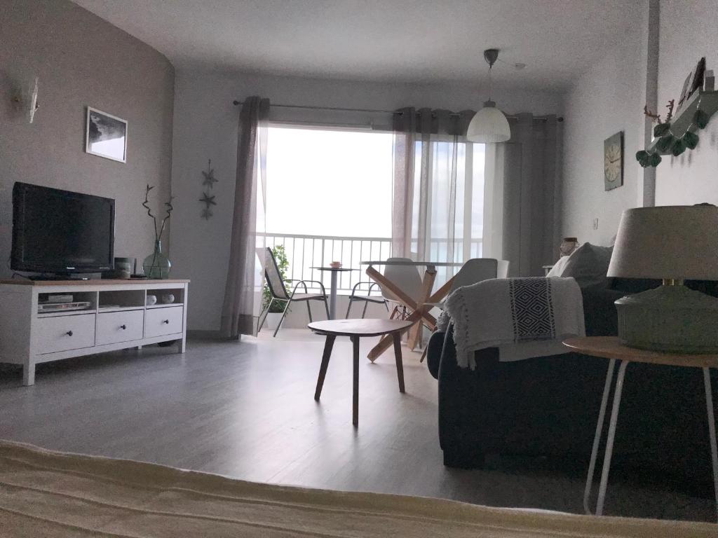 TV a/nebo společenská místnost v ubytování Monisunset