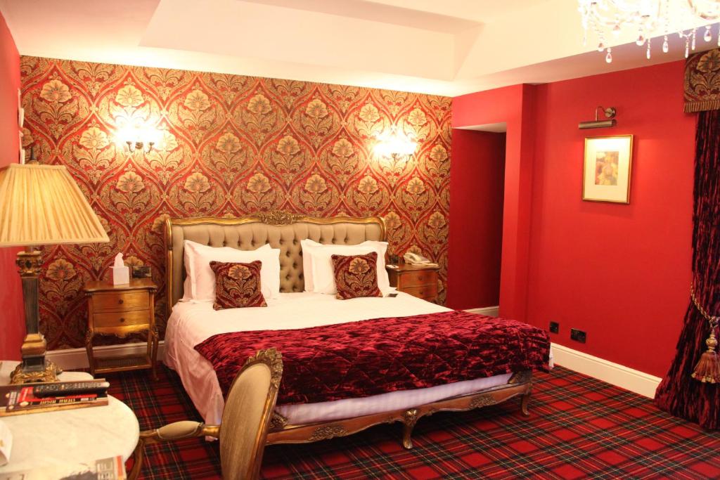 Postel nebo postele na pokoji v ubytování Earl Of Doncaster Hotel