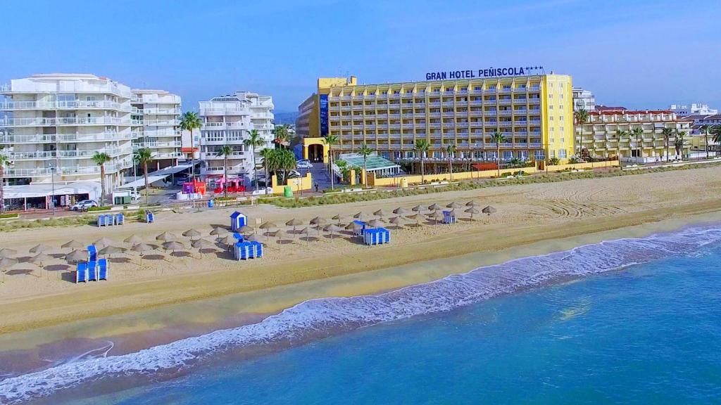 an aerial view of a beach with a hotel at Gran Hotel Peñiscola in Peniscola
