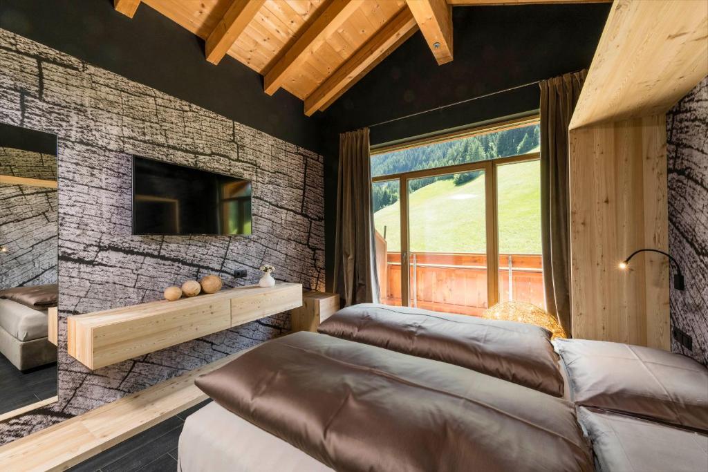 TV a/nebo společenská místnost v ubytování Hotel Jaufentalerhof
