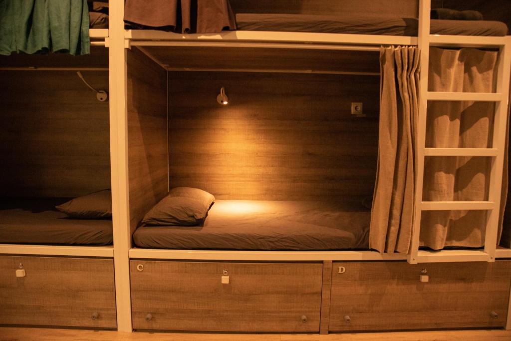 Postel nebo postele na pokoji v ubytování Cantagua Hostel