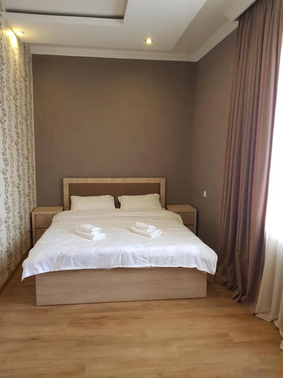 Postel nebo postele na pokoji v ubytování White House in Kakheti Eniseli