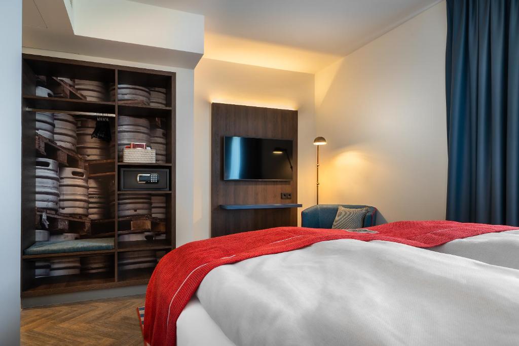 Postel nebo postele na pokoji v ubytování Holiday Inn - the niu, Keg Hamburg Ost by IHG