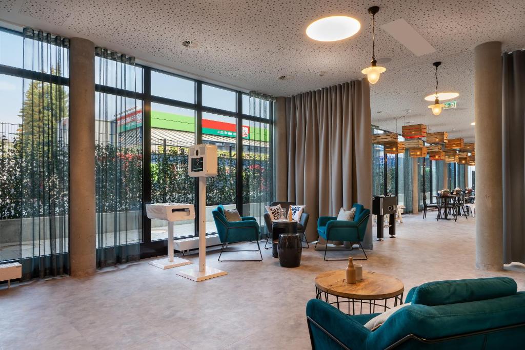 Posezení v ubytování Holiday Inn - the niu, Keg Hamburg Ost by IHG