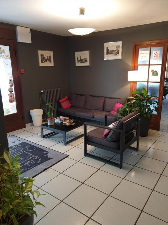 Posezení v ubytování Hôtel Malpel