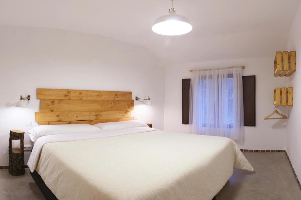 Postel nebo postele na pokoji v ubytování El Pajar Negro