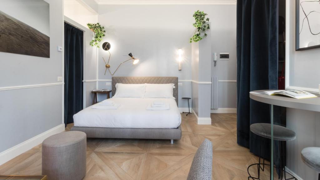 Postel nebo postele na pokoji v ubytování Italianway - Garigliano 4 Flat