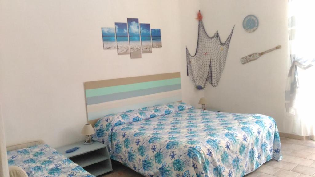 Posteľ alebo postele v izbe v ubytovaní Casa Allegra