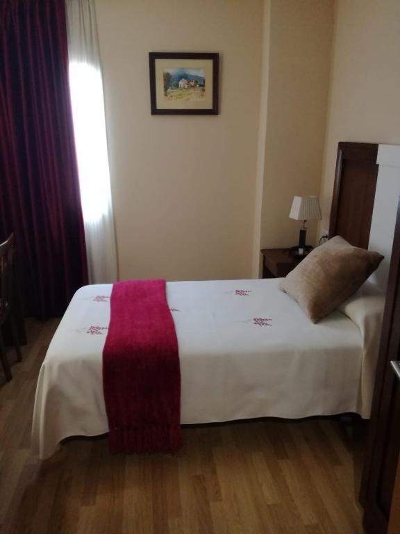 Postel nebo postele na pokoji v ubytování Hotel Arcco Ubeda