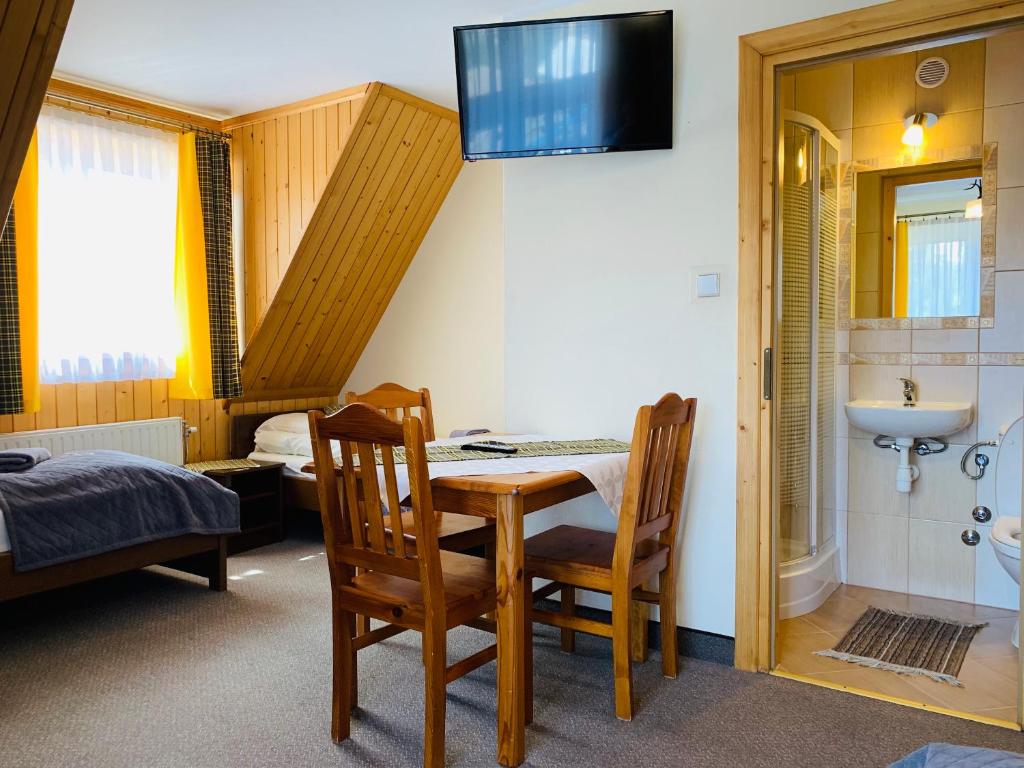 Ένα μπάνιο στο Gościniec nad Suchą Wodą z Sauną w ogrodzie