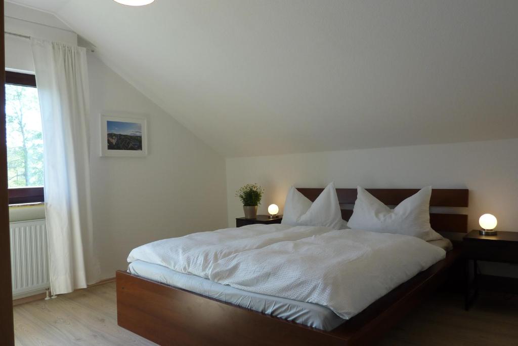 Een bed of bedden in een kamer bij Bei Mechlers