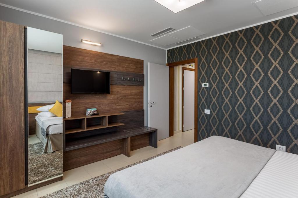 Postel nebo postele na pokoji v ubytování Splendid Conference & Spa Hotel – Adults Only