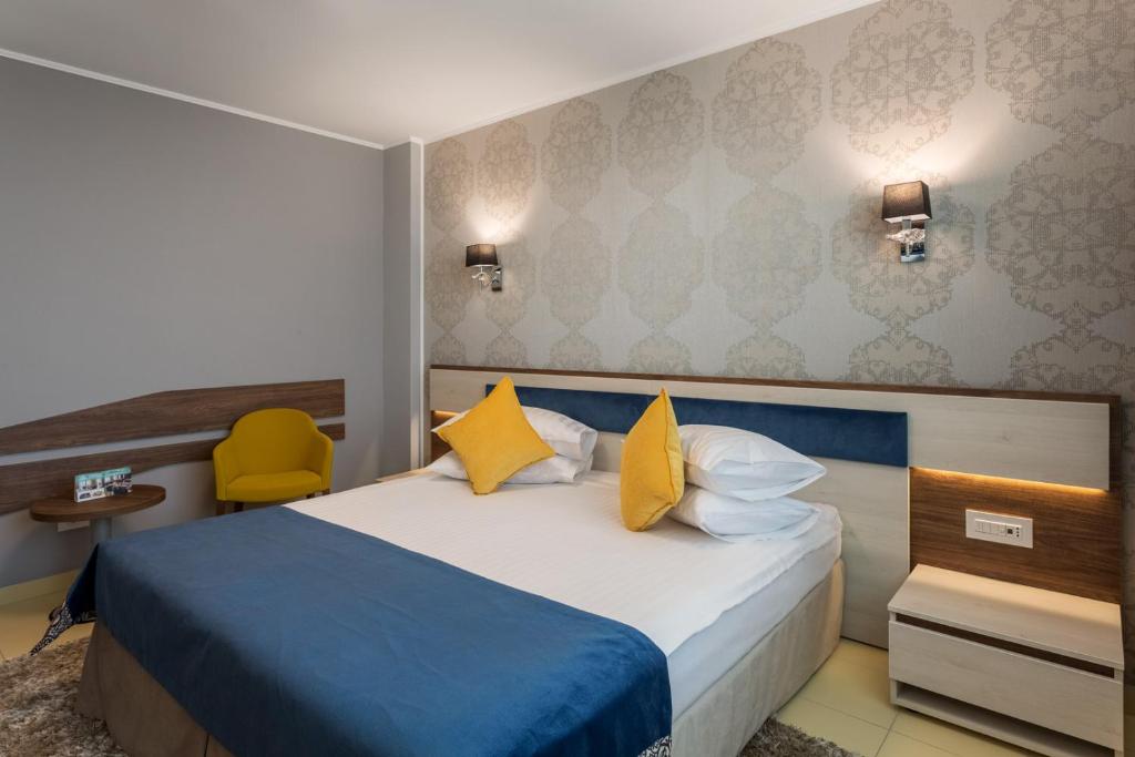 Postel nebo postele na pokoji v ubytování Splendid Conference & Spa Hotel – Adults Only