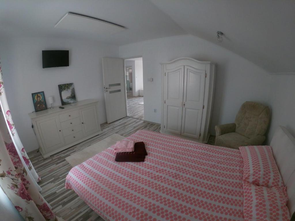 Postel nebo postele na pokoji v ubytování Casa Sannicolau