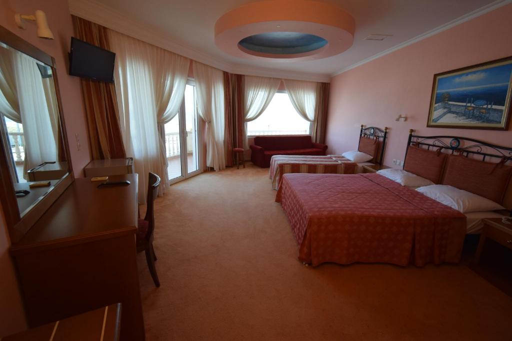 Postel nebo postele na pokoji v ubytování Hotel Aperio