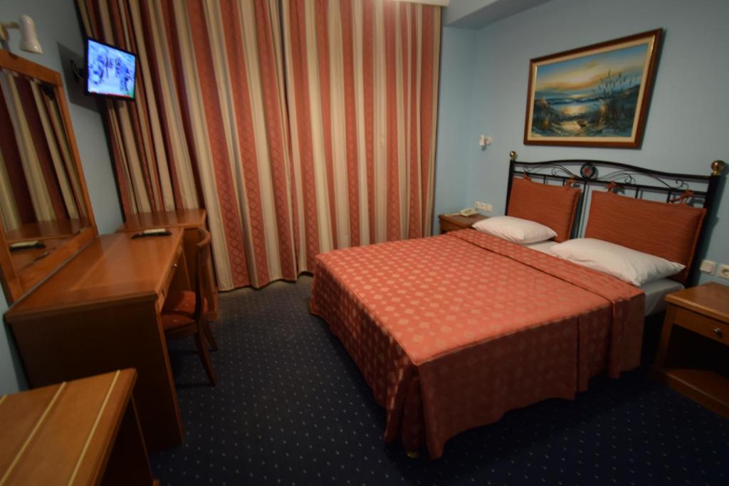 Postel nebo postele na pokoji v ubytování Hotel Aperio
