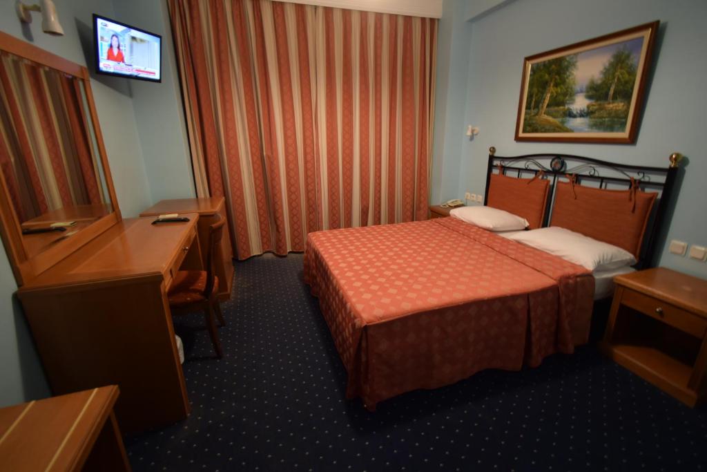 Postel nebo postele na pokoji v ubytování Hotel Aperio