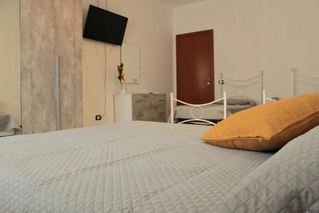 Postel nebo postele na pokoji v ubytování Fiori d'aMare