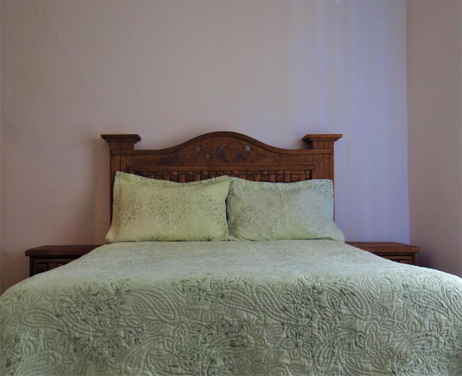 Postel nebo postele na pokoji v ubytování Hotel Purisima Concepción