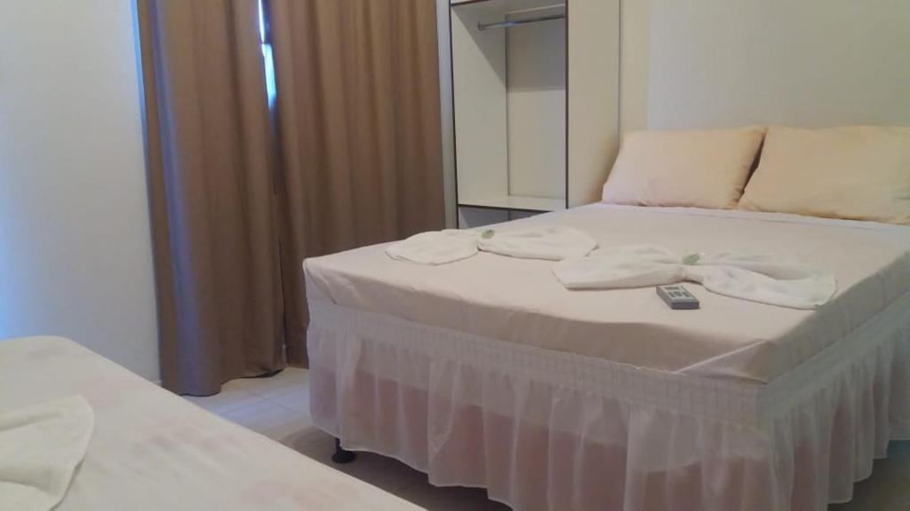 Postel nebo postele na pokoji v ubytování Hotel Alelos - Ituaçu Bahia