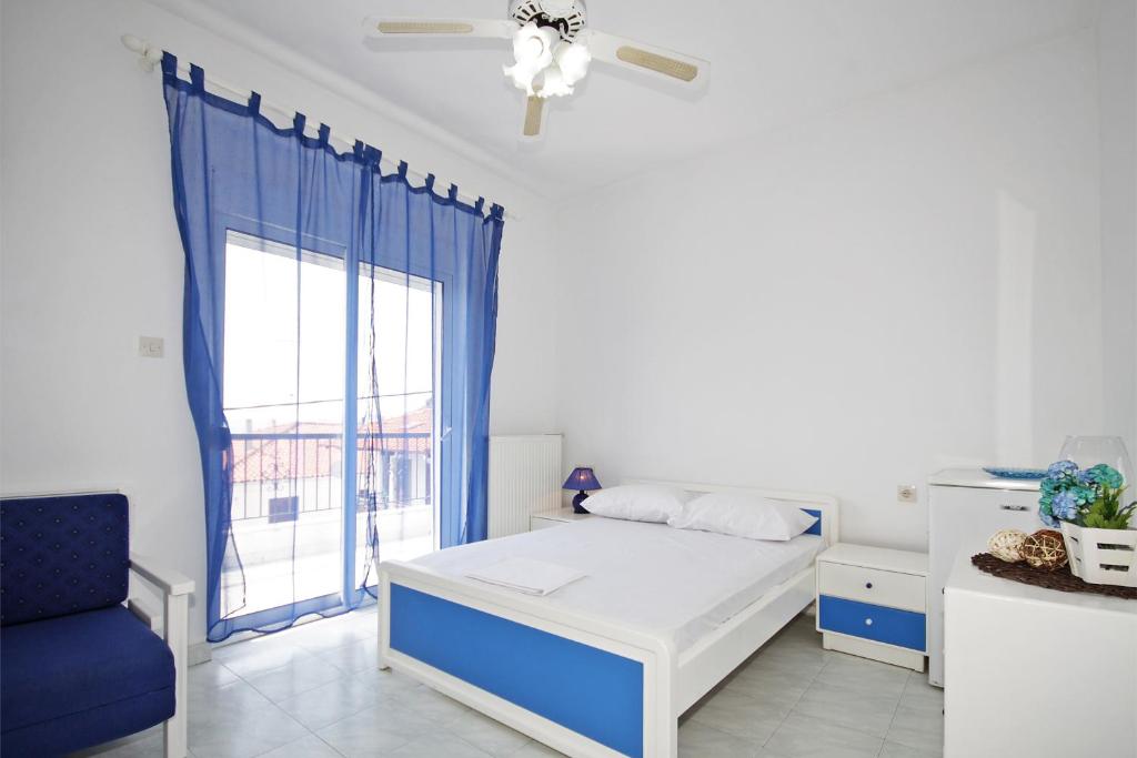 Postel nebo postele na pokoji v ubytování Hotel Elena