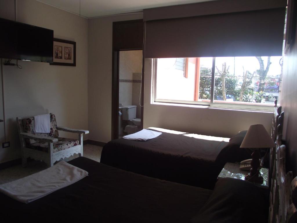 Postel nebo postele na pokoji v ubytování Hotel Palacio