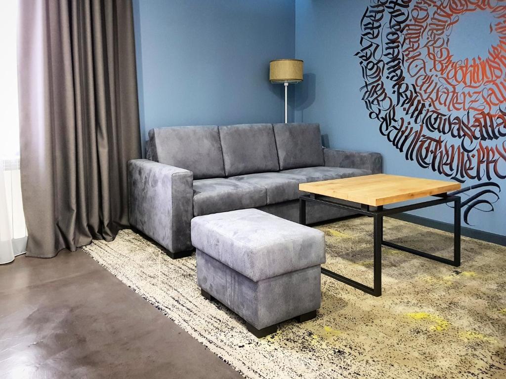 Posezení v ubytování Hotel Alpha