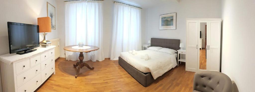 Posteľ alebo postele v izbe v ubytovaní Appartamento La Terrazza Firenze centro storico