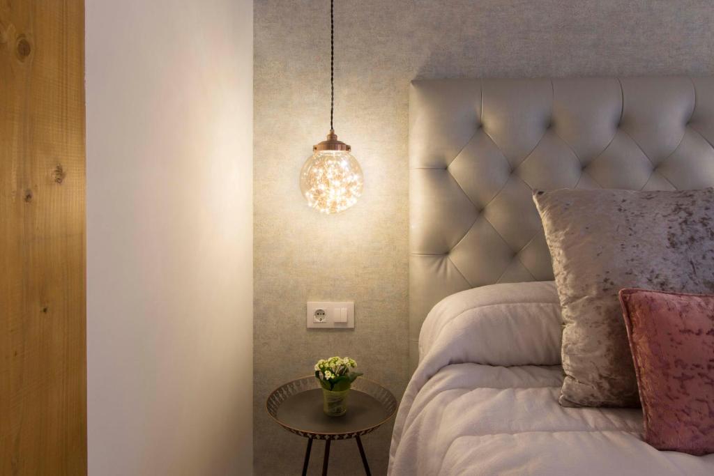 A bed or beds in a room at El Mirador de Eloísa