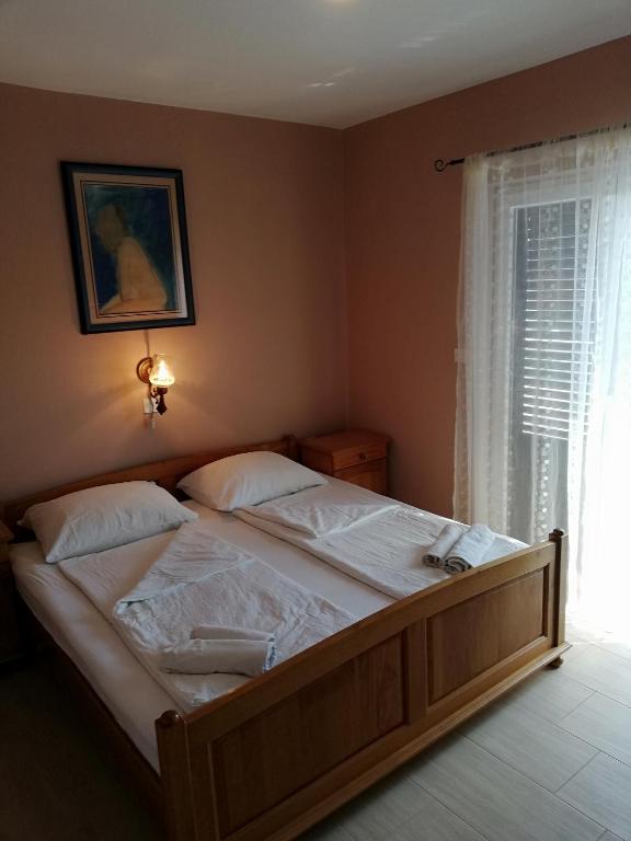 Postel nebo postele na pokoji v ubytování Guesthouse Marija