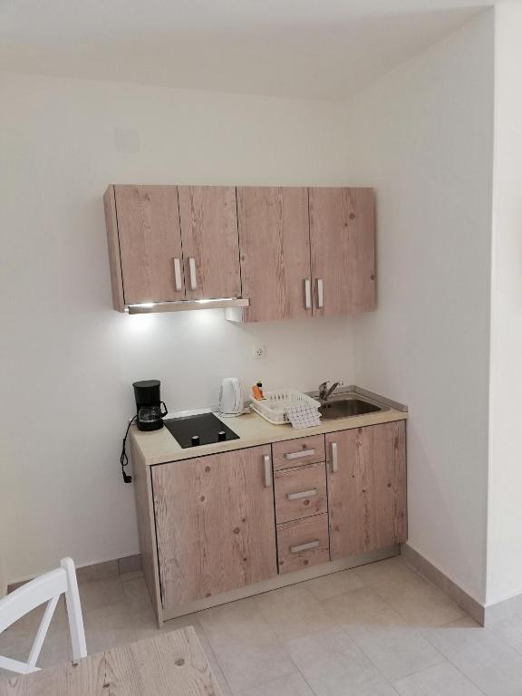 Kuchyň nebo kuchyňský kout v ubytování Guesthouse Marija