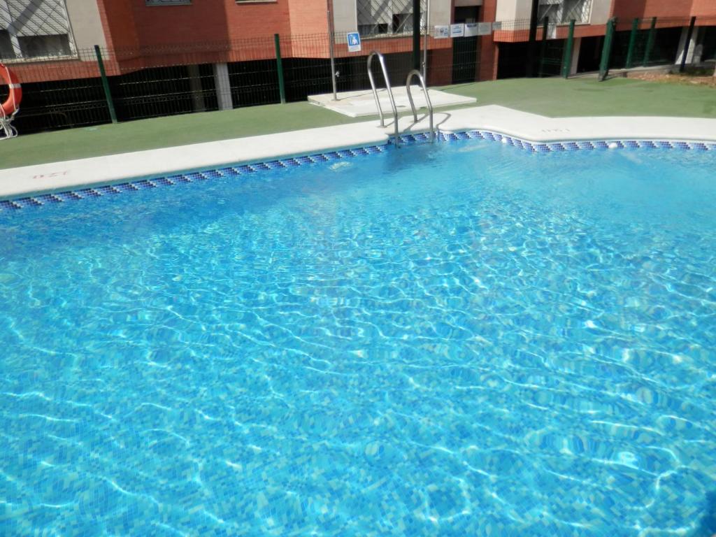 Bazén v ubytovaní Apartamentos Vértice Bib Rambla alebo v jeho blízkosti