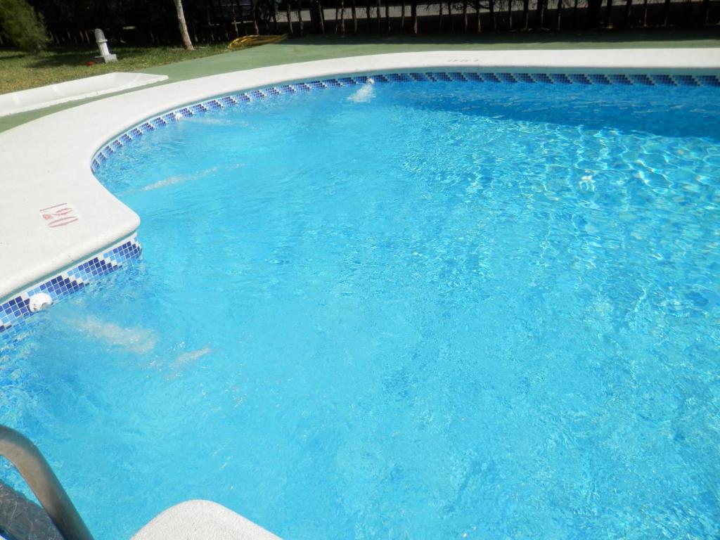 Bazén v ubytovaní Apartamentos Vértice Bib Rambla alebo v jeho blízkosti