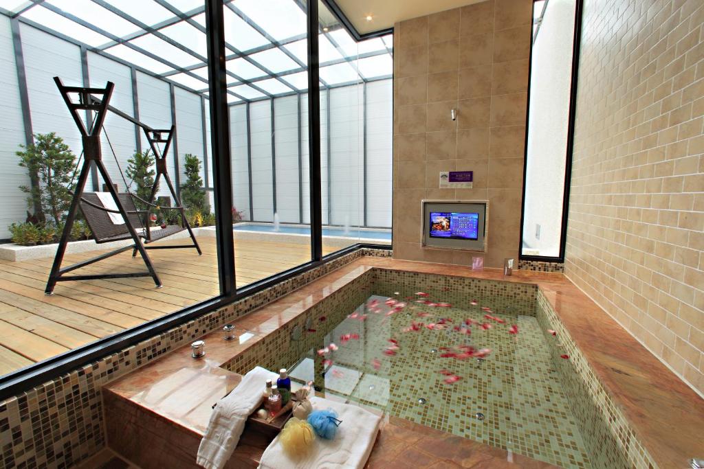 TV a/nebo společenská místnost v ubytování Affair motel Co.Ltd
