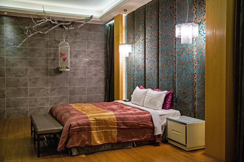 Postel nebo postele na pokoji v ubytování Affair motel Co.Ltd