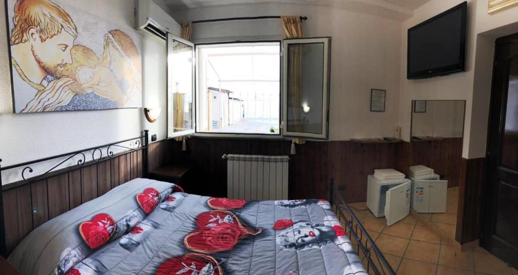 Postel nebo postele na pokoji v ubytování Camere Sul Mare