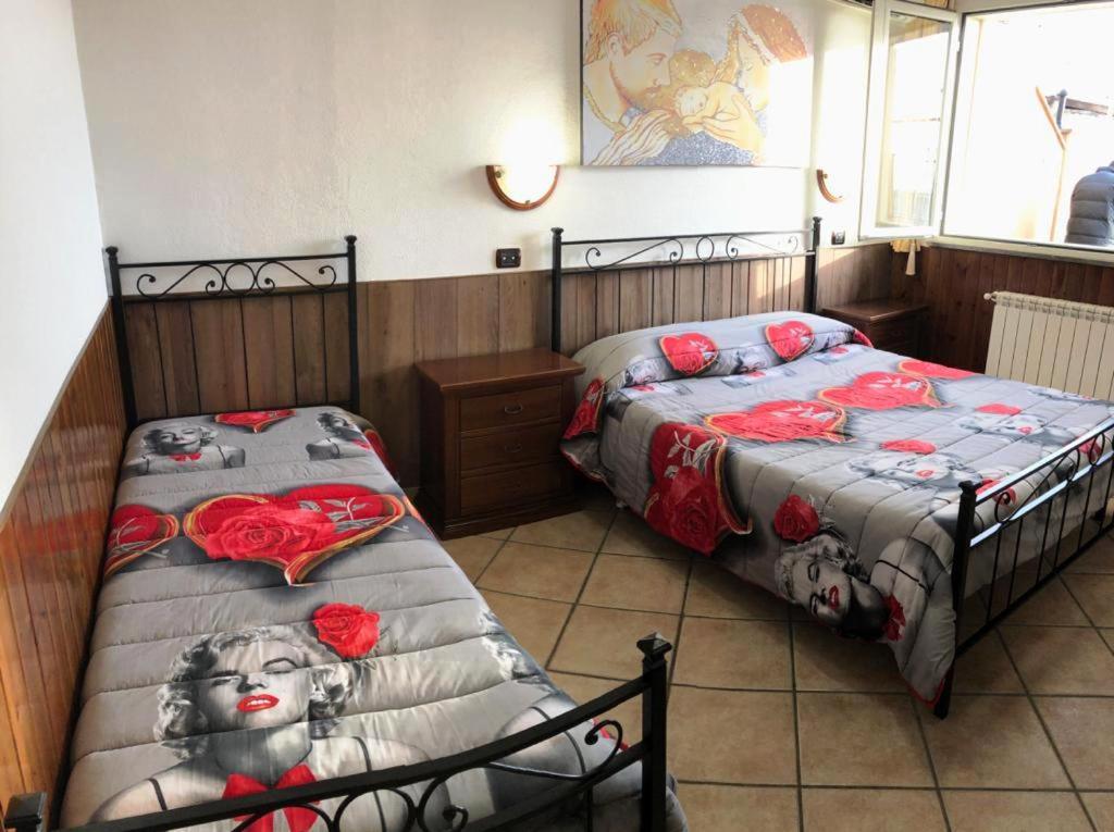 Postel nebo postele na pokoji v ubytování Camere Sul Mare