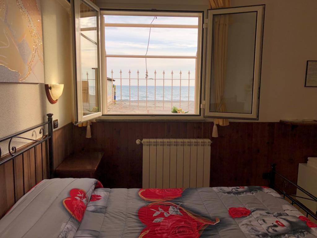 Postel nebo postele na pokoji v ubytování Camere Sul Mare