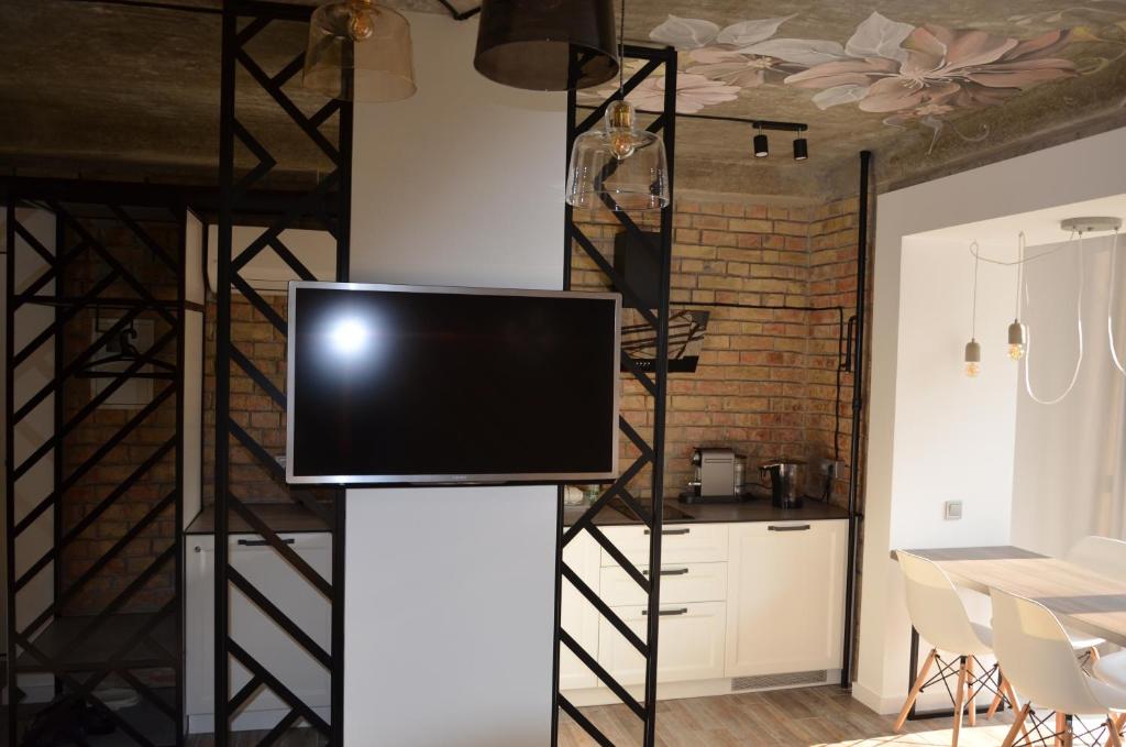 TV a/nebo společenská místnost v ubytování StanGret Hotel