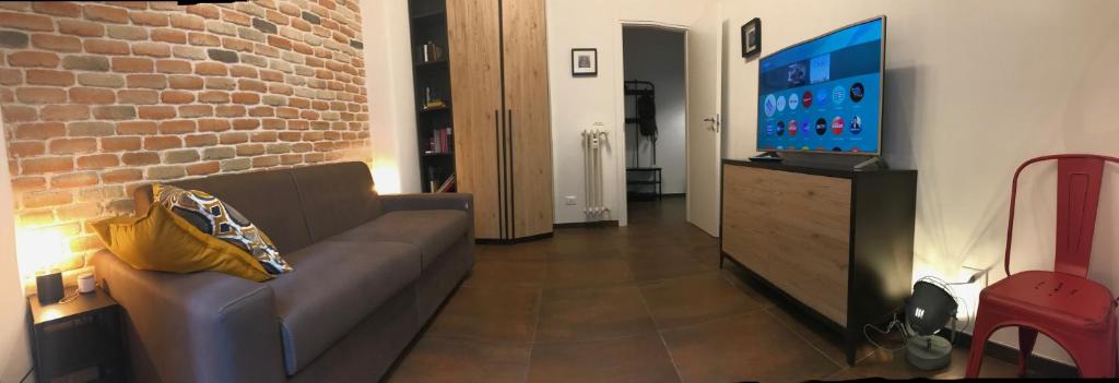 Telewizja i/lub zestaw kina domowego w obiekcie Appartamento in via Licia