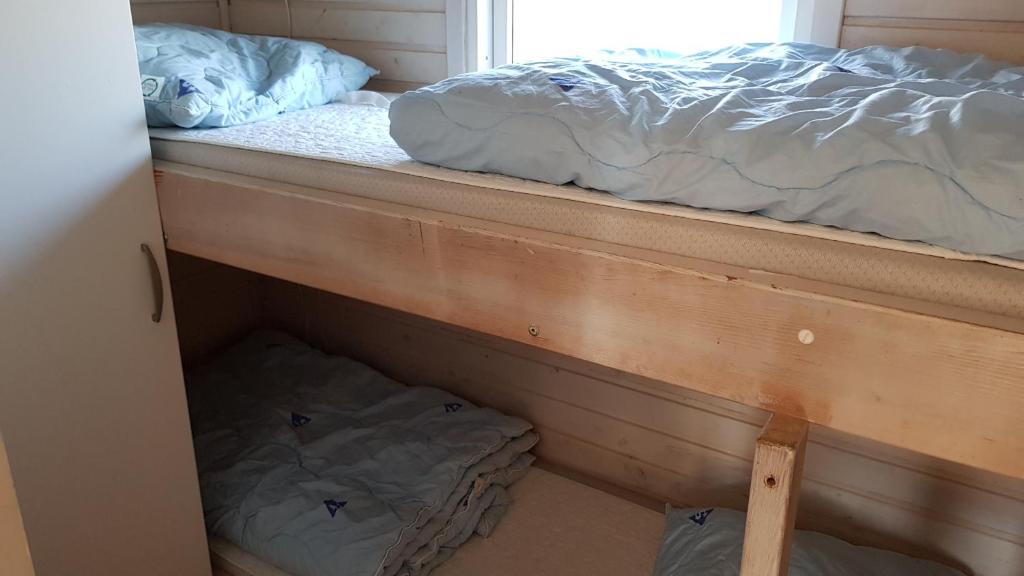 Postel nebo postele na pokoji v ubytování Helsingør Camping & Cottages Grønnehave