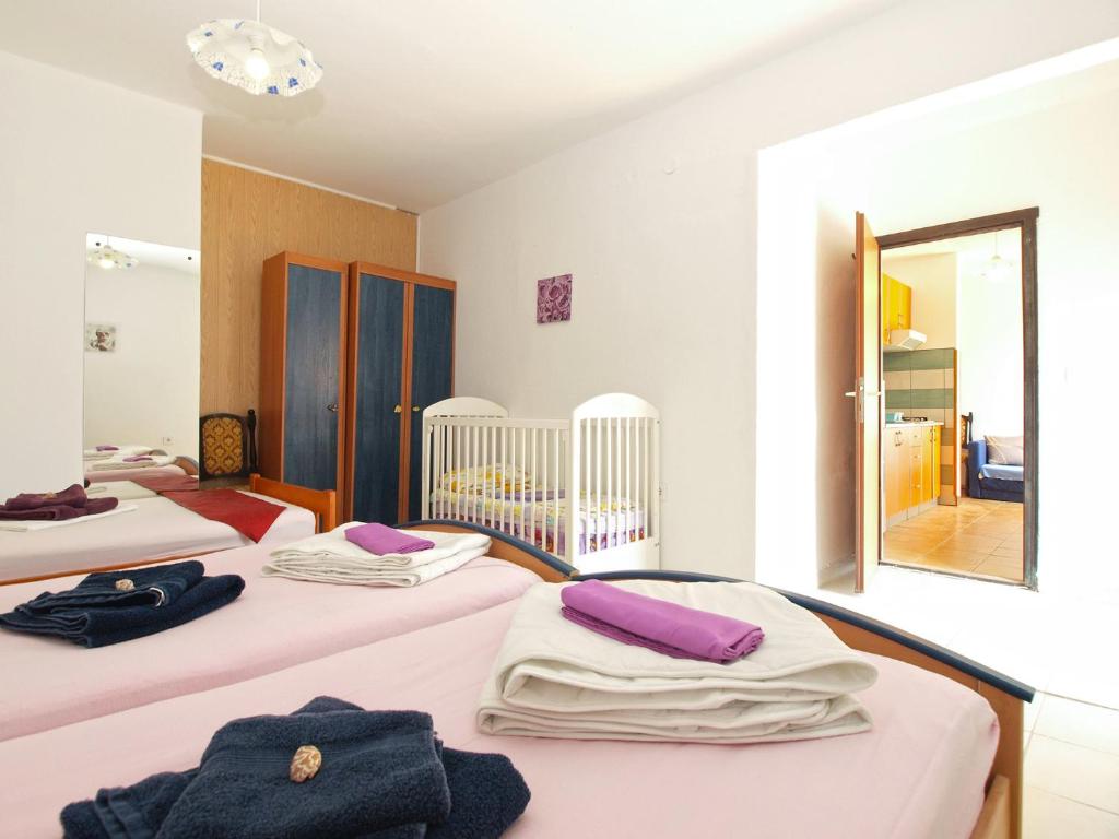 Posteľ alebo postele v izbe v ubytovaní Apartments Davor 1676