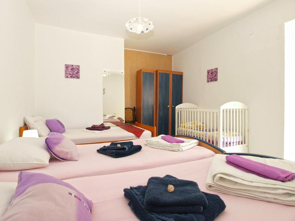 Posteľ alebo postele v izbe v ubytovaní Apartments Davor 1676