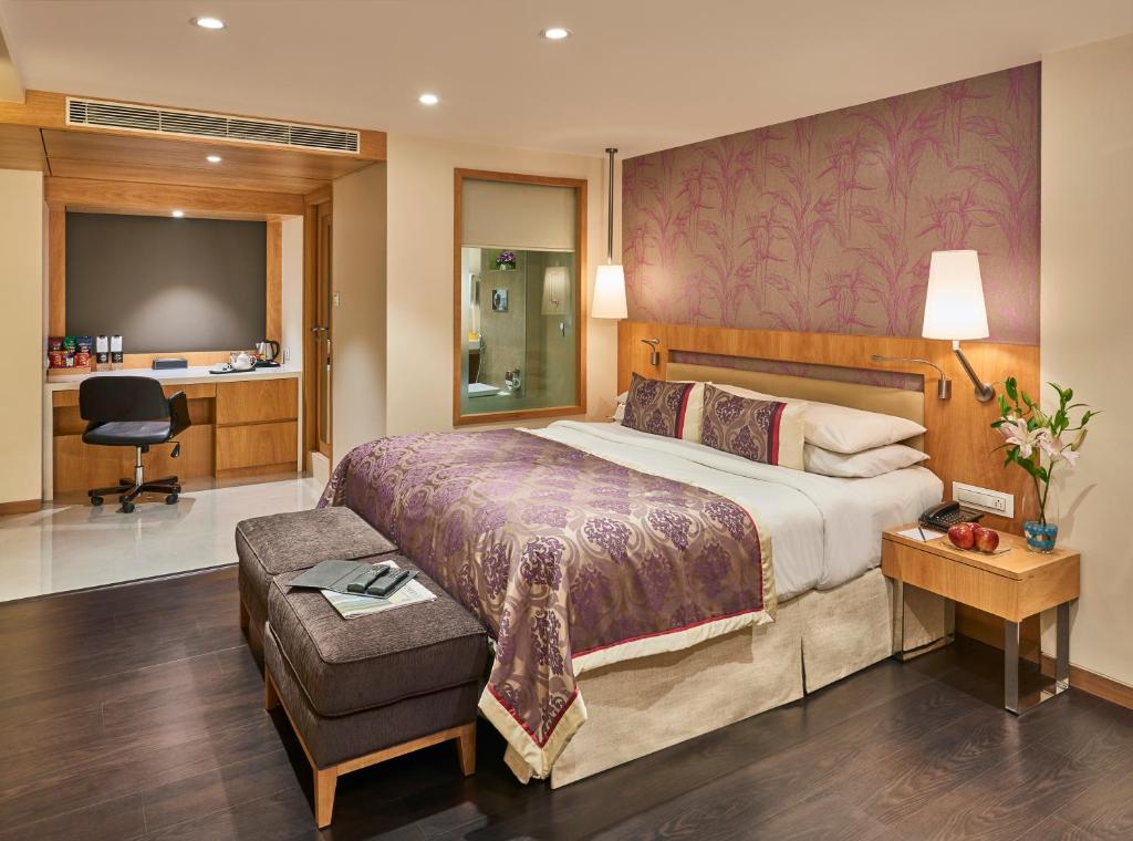 Voodi või voodid majutusasutuse Hotel Bawa International toas