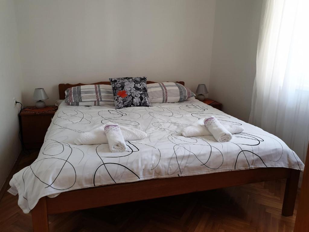 Postel nebo postele na pokoji v ubytování Guest House Miro
