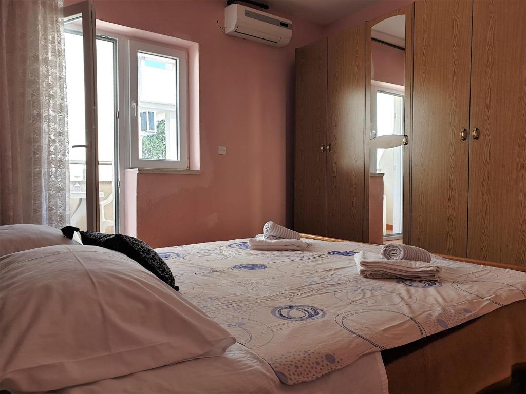 Postel nebo postele na pokoji v ubytování Guest House Miro