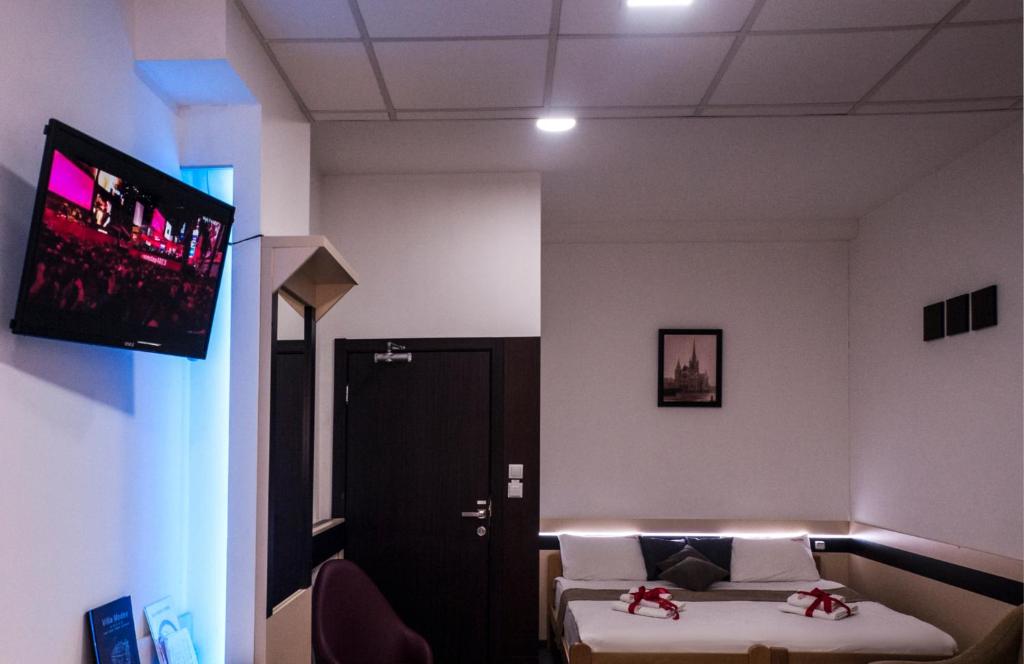 TV a/nebo společenská místnost v ubytování Guesthouse Villa Modex
