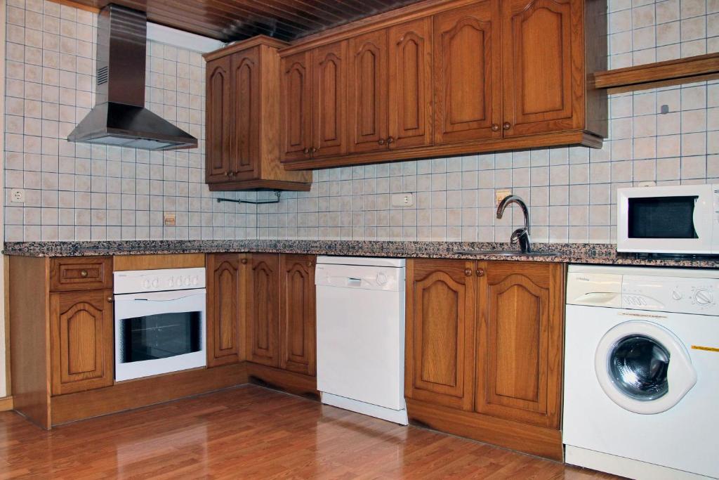 Kuchyň nebo kuchyňský kout v ubytování Apartamentos Deth Camin Reiau