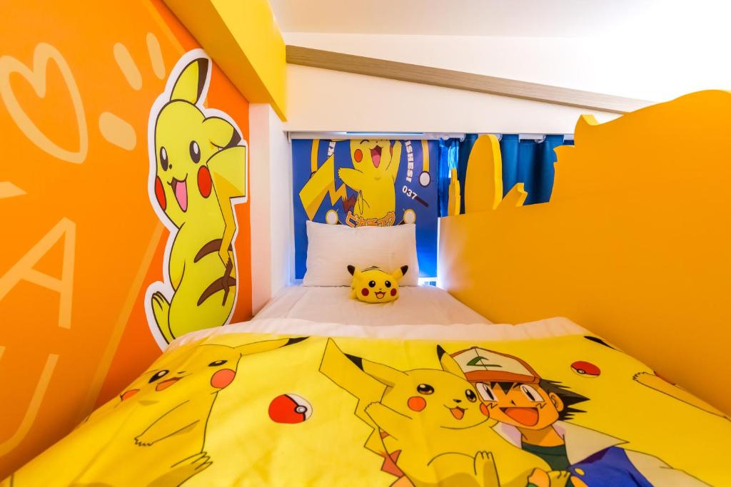 Postel nebo postele na pokoji v ubytování 松楓親子民宿Songfeng Family B&B
